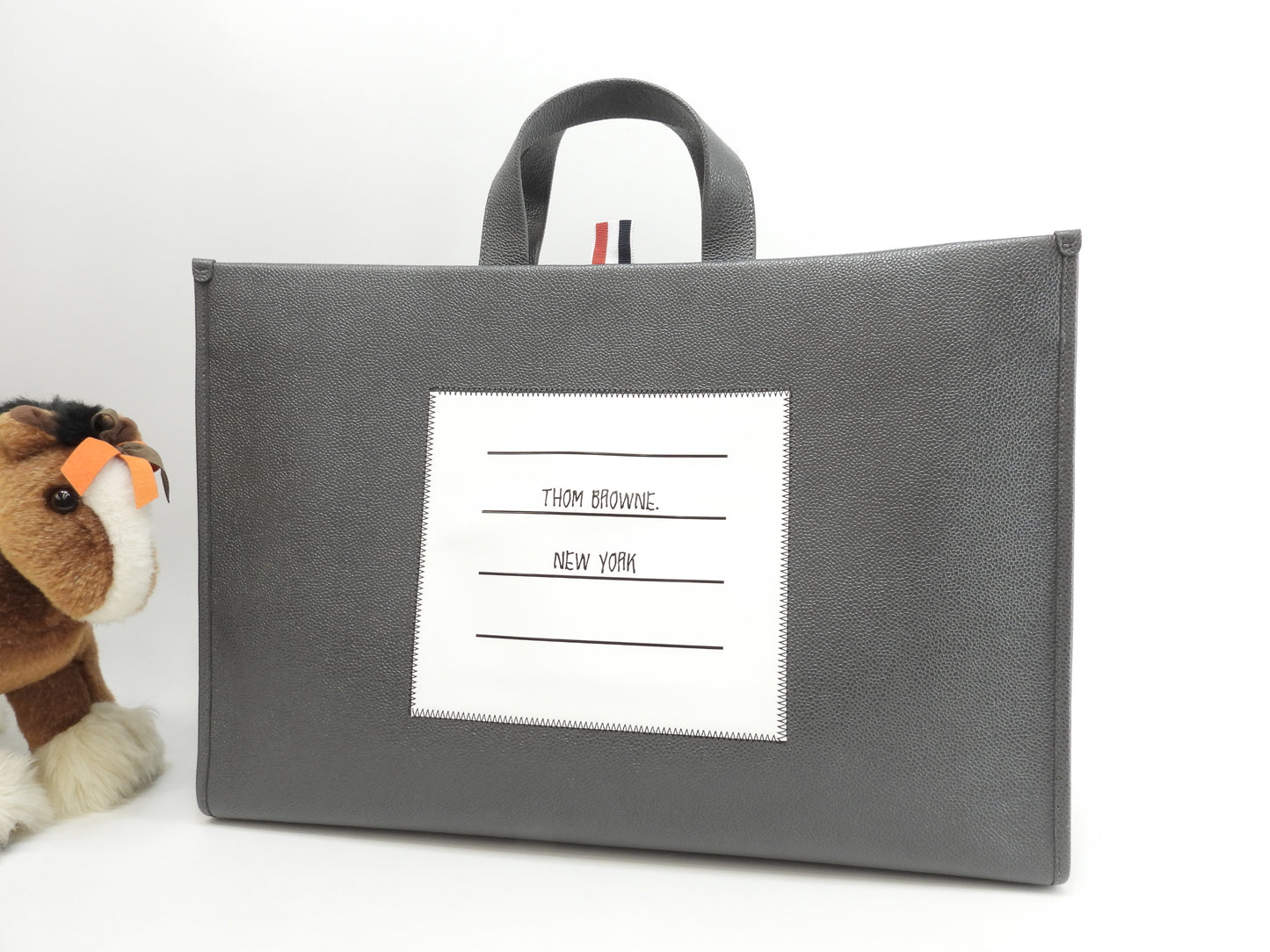 トムブラウン スクエアトートバッグ ペーパーラベルロゴ キャビアレザー灰 メンズ ハンドバッグ@ 1